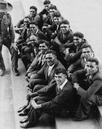 Unknown Argus photographer Aboriginal men from Lake Tyers wait outside the Quarter Master's Store for 2nd A.I.F. uniforms, c.1940 Silver gelatin photograph, Picture Collection, H99.201/284 [photograph]